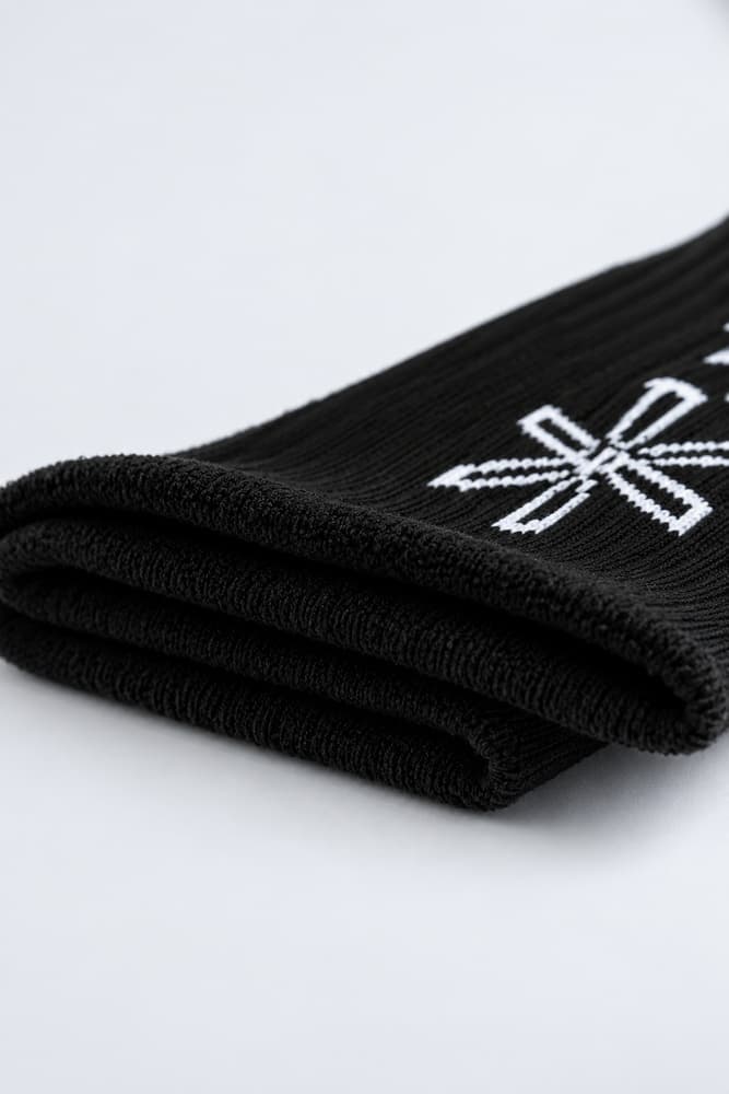 115_50301f7d68-bara-black-long-socks-running-full